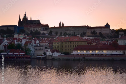 Evening landscape of the Vltava river and Prague Castle in Old Prague. Beautiful sunset.