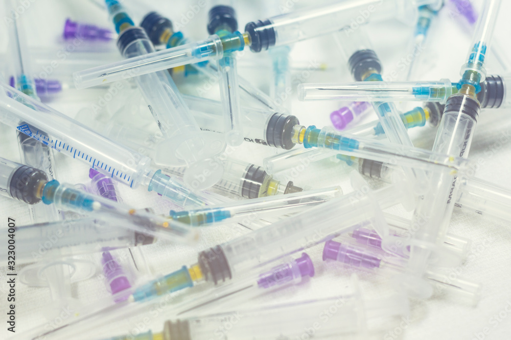 Syringe with needle, used syringes