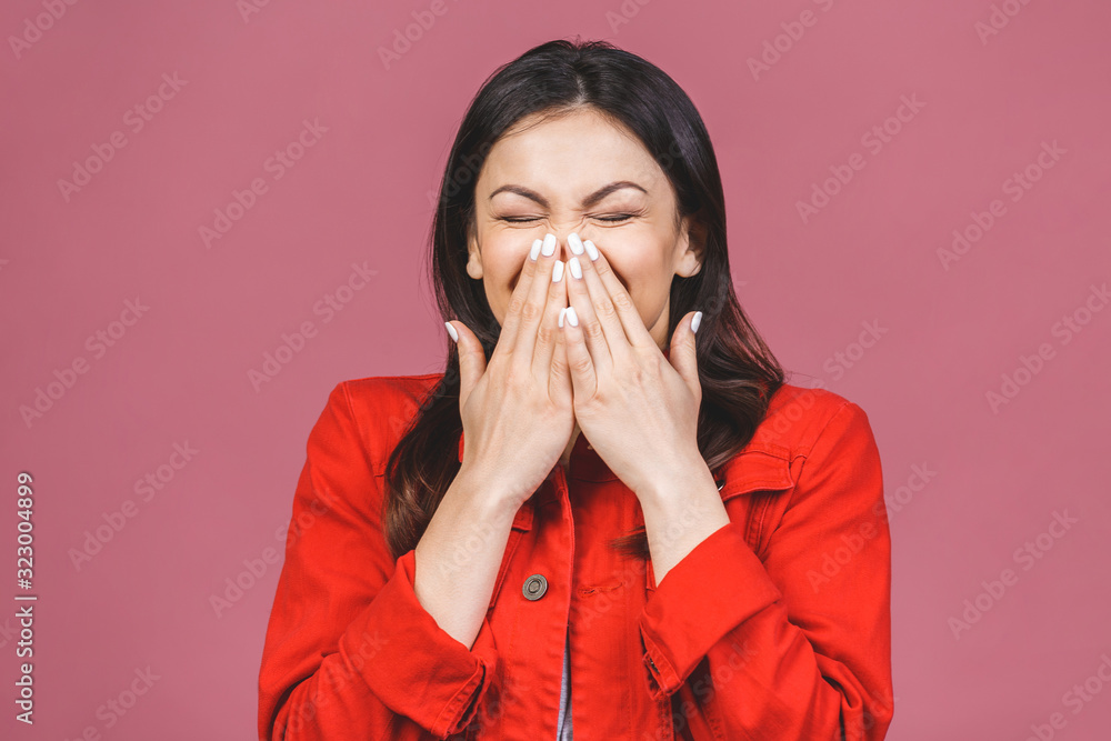 Portrait of foolish positive girl with modern hairstyle laughing sincerely with beaming smile isolated on pink background. Mood inspiration enjoyment pleasure concept. Portrait of foolish positive girl with modern hairstyle laughing sincerely with beaming smile isolated on pink background. Mood inspiration enjoyment pleasure concept.