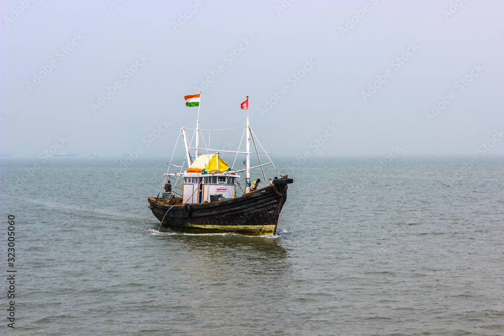 small boat in Mumbai ocean. Ferry in Mumbai ocean, Old ship in sea.