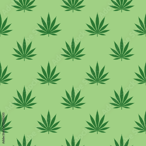 Seamless Cannabis leaves pattern staggered on green background. Also known as marijuana is a psychoactive drug from the Cannabis plant used for medical or recreational purposes. 