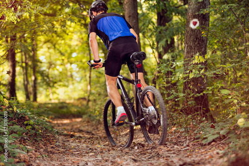 cyclist riding mountain bike .Spring, nature ,sport concept
