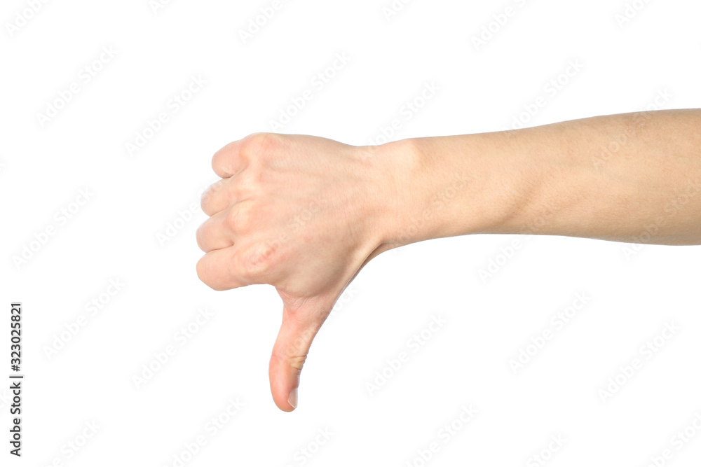 Male hand thumb down, isolated on white background. Gestures Male hand thumb down, isolated on white background. Gestures