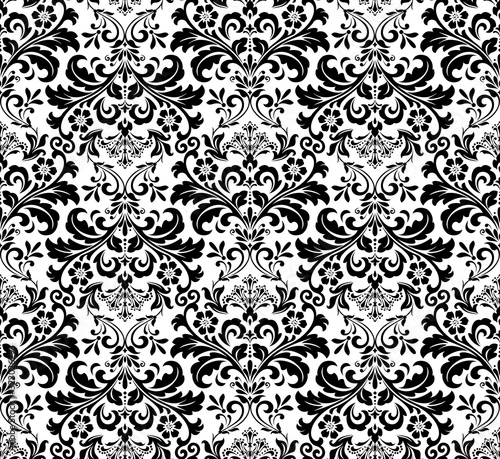 Wallpaper in the style of Baroque. Seamless vector background. White and black floral ornament. Graphic pattern for fabric, wallpaper, packaging. Ornate Damask flower ornament