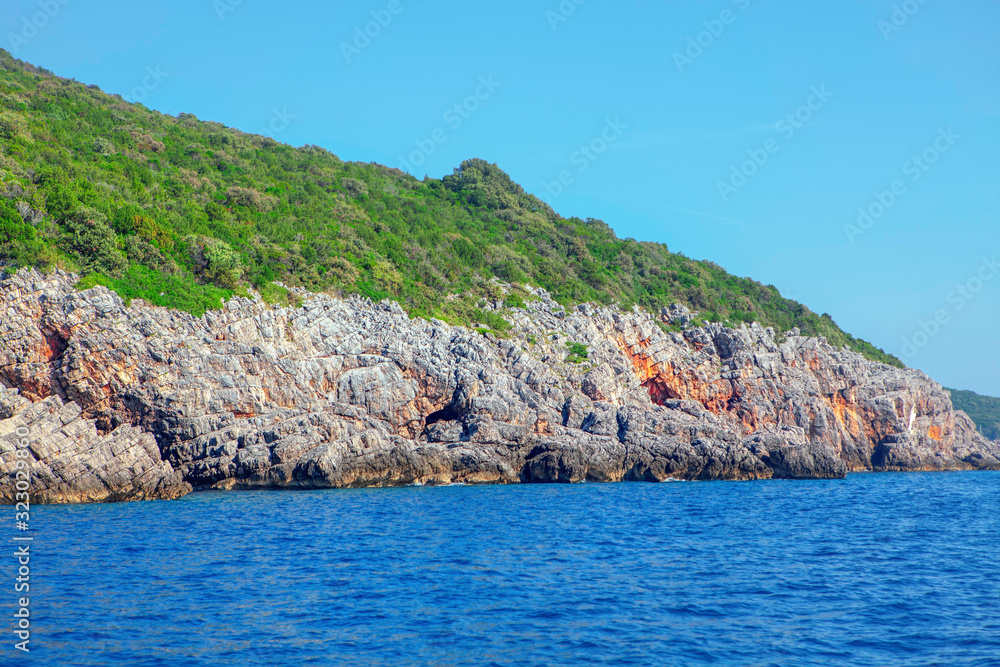 view of rocky coast and blue sea 