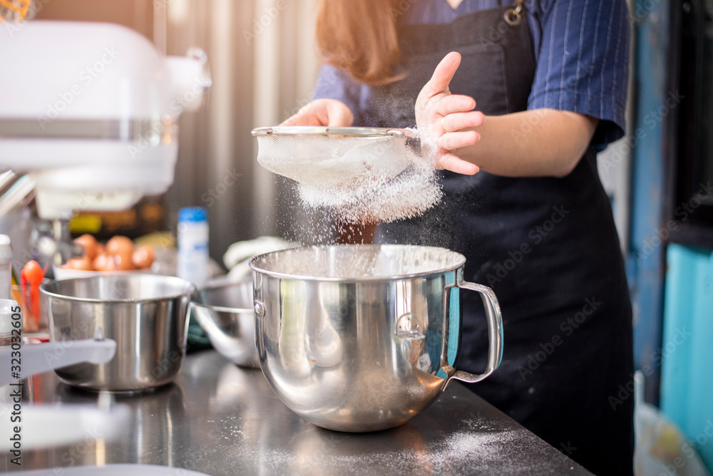 Beautiful woman is making bakery Beautiful woman is making bakery