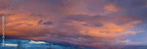 red sky panorama - beautiful red clouds at sunset © Roman