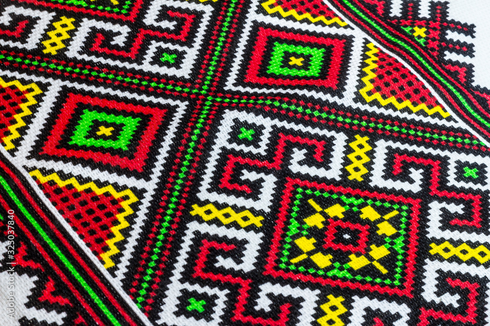 The texture of hand- embroidered , close-up The texture of hand- embroidered , close-up