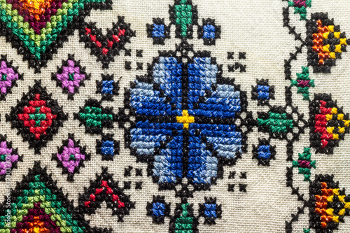 The texture of hand- embroidered , close-up