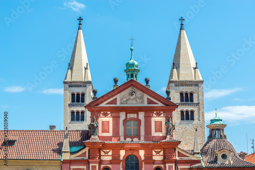 View of the top of old buildings with red roof and blue sky at Prague city Czech republic.