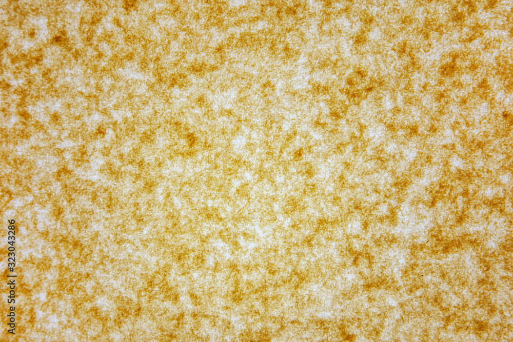 Background of wrapping paper, with fibers on a shined background, light brown
