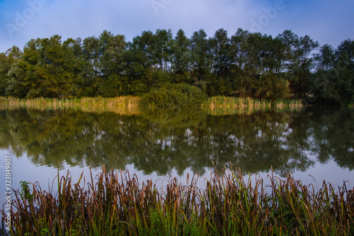 Hrase pond lake in summer morning