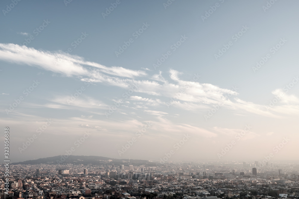 Panorama of city in sunny day with diagonal clouds Panorama of city in sunny day with diagonal clouds