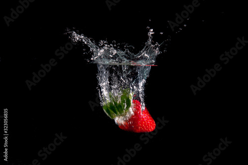 Fresh Strawberries with water splash