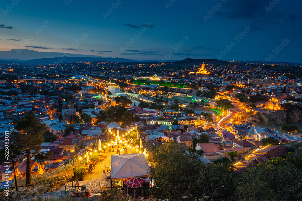 Obraz premium Evening Tbilisi, Georgia. A lot of lights and lanterns in the historic city center.