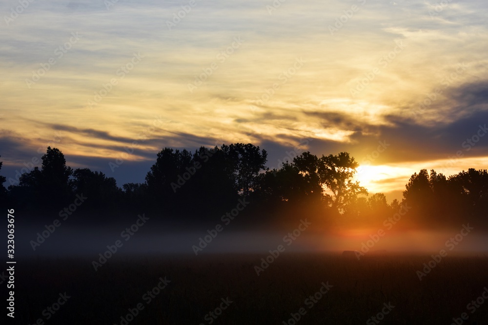 country sunrise over a field