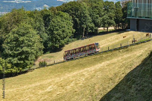 The Gurten funicular lets you to reach a paradise of green meadows and breathtaking views of the snowy caps of the Bernese Oberland region, the sparkling Aare river and the city of Bern, Switzerland