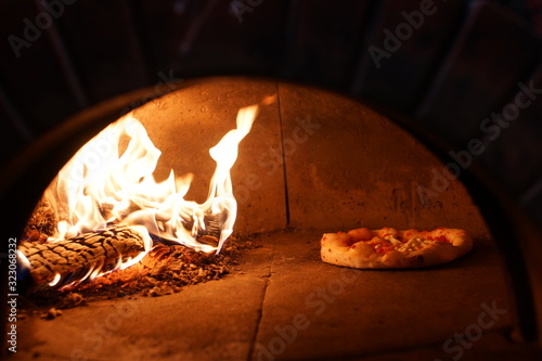 Neapolitan pizza cooked in a wood oven