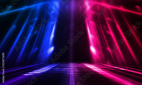 Empty stage, blue and pink, purple  neon, abstract background. Rays of searchlights, light, abstract tunnel, corridor. © MiaStendal