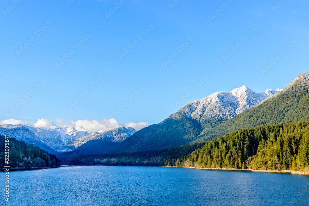 Snow Mountains and Capilano Lake in Vancouver British Columbia Pacific Northwest.