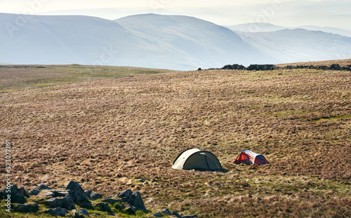 Two tents pitched near the summit of Thornthwaite in the Lake District UK.
