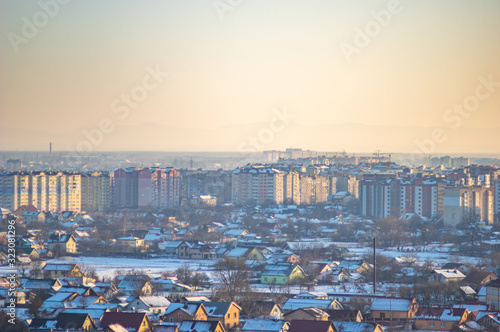 Winter city houses in haze © onyx124
