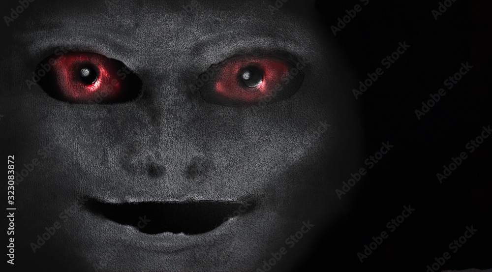 Scary creature with red eyes. Portrait an alien or demon. vision from a nightmare. Vampire face on a background. Scary face. Stock Illustration | Stock