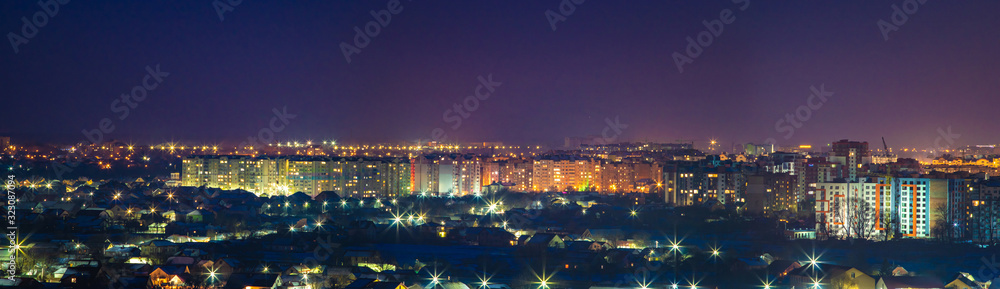 Fototapeta premium Night panorama of the city in winter
