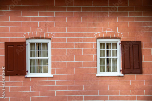Brick wall with white windows