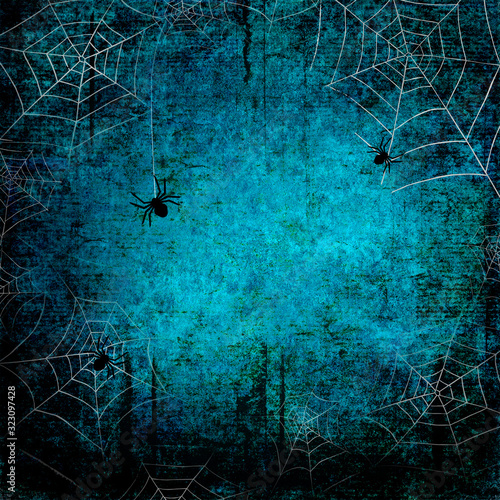 Halloween blue teal gray grunge background with silhouettes of spider webs