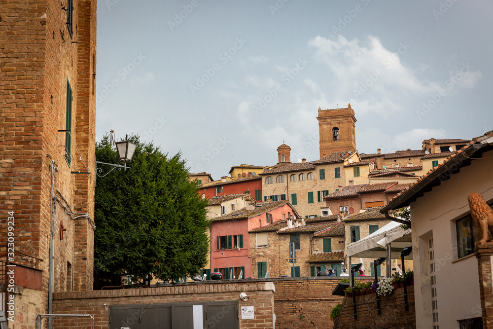 a neighborhood with typical houses in Siena city, Tuscany, Italy
