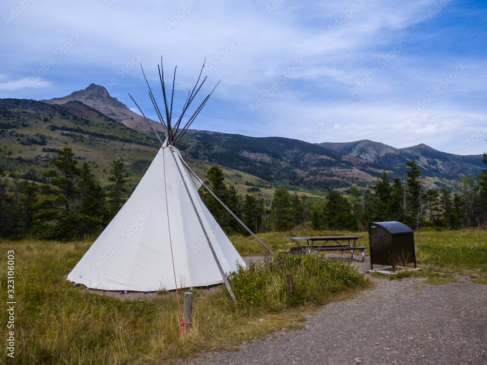 Unusual campsite with teepee nestled in the mountains at Waterton Lakes National Park