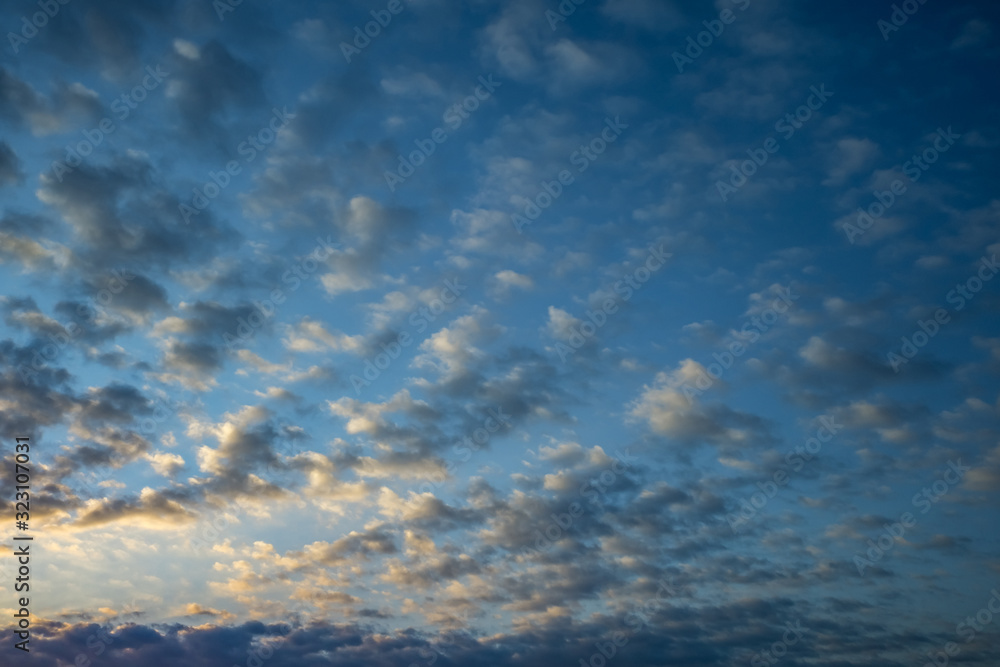 dark Blue sky background with tiny stratus cirrus striped clouds. Clearing evening and Good windy weather dark Blue sky background with tiny stratus cirrus striped clouds. Clearing evening and Good windy weather