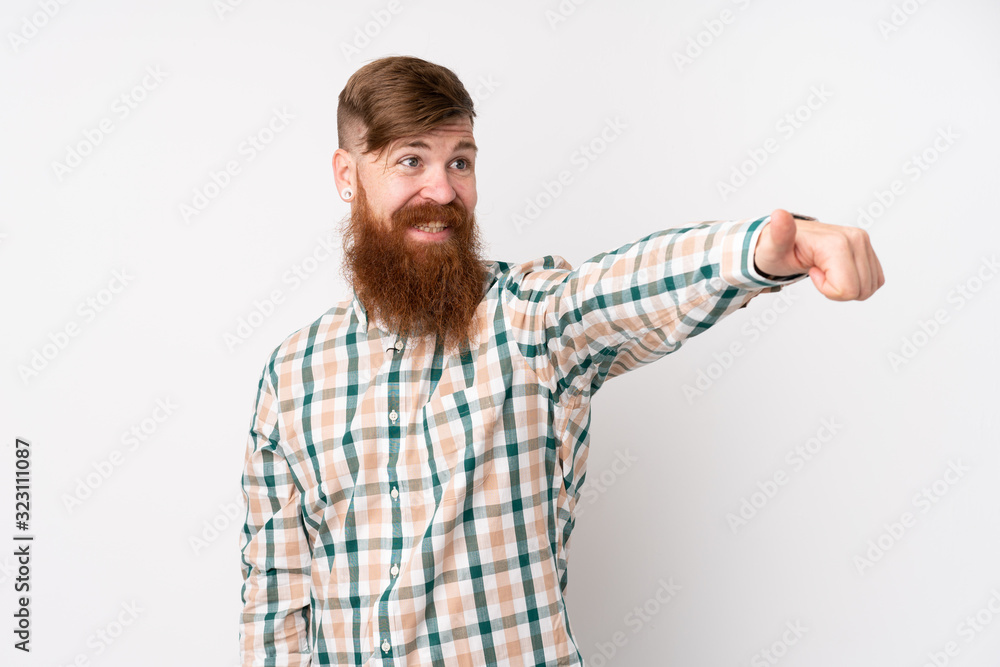 Redhead man with long beard over isolated white background giving a thumbs up gesture Redhead man with long beard over isolated white background giving a thumbs up gesture