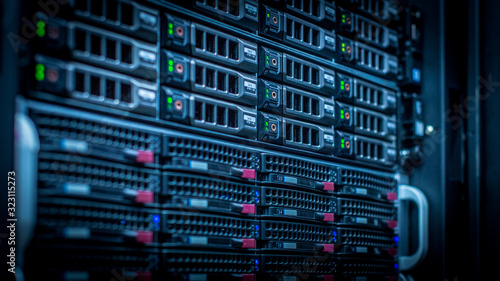 Server room full of racks and servers photo