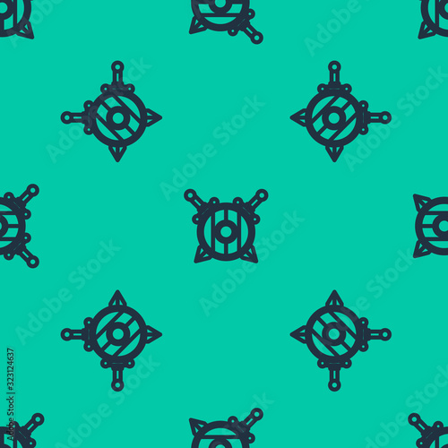 Blue line Medieval wooden shield with crossed swords icon isolated seamless pattern on green background. Vector Illustration