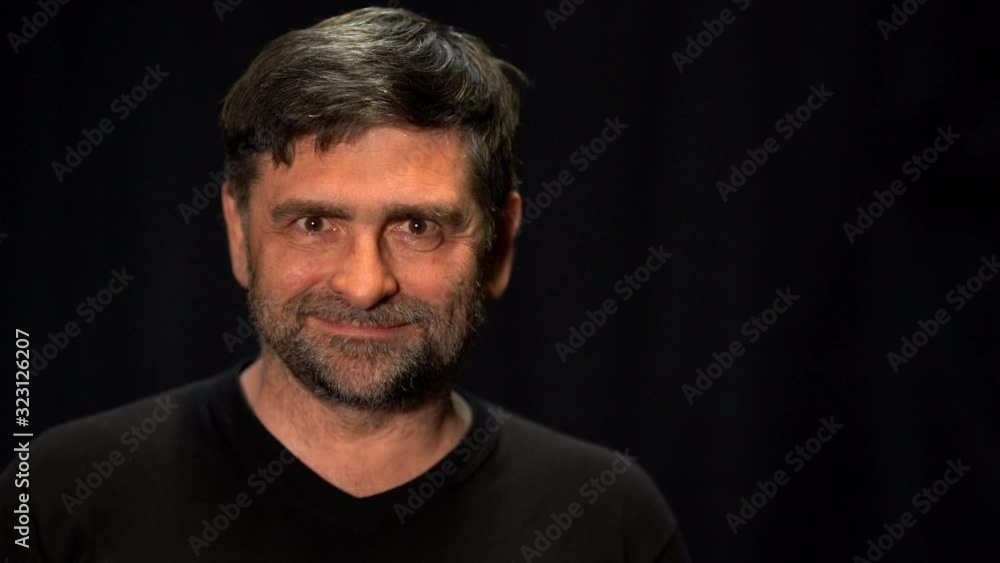 senior man threatening looking into camera senior man threatening looking into camera