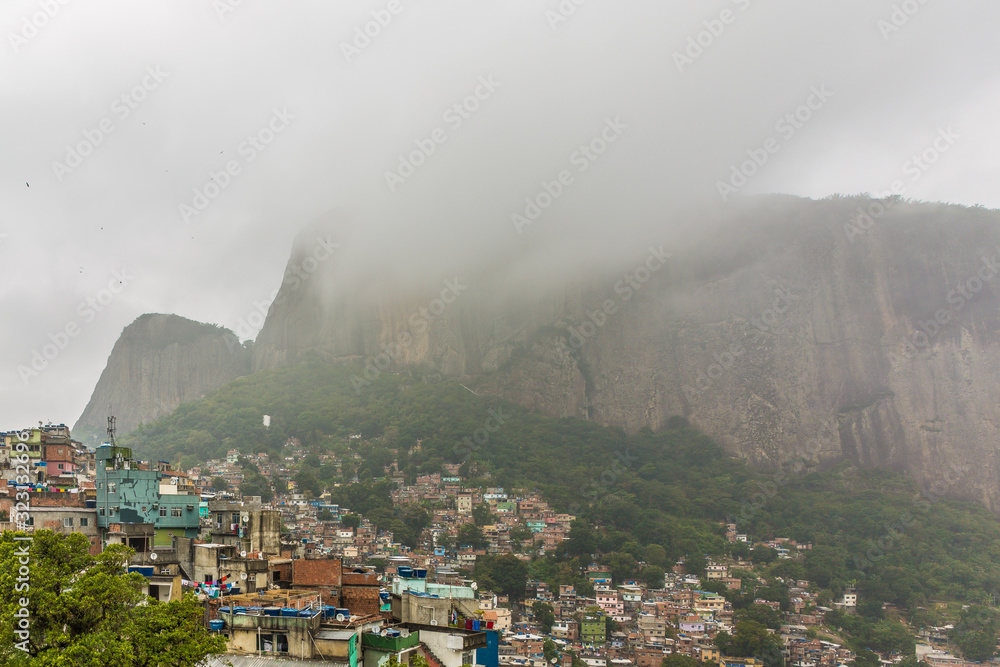 Rocinha favela, also known as a slum or shanty town, built on a steep ...