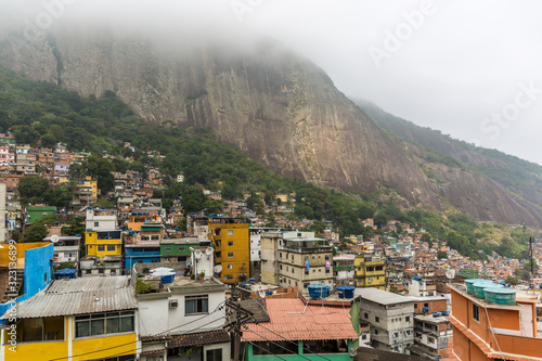 Rocinha favela, also known as a slum or shanty town, built on a steep hillside in the South Zone of Rio Di Janeiro, Brazil, South America photo