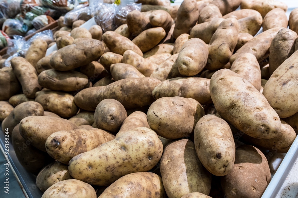 Fresh organic young potatoes sold on market Fresh organic young potatoes sold on market