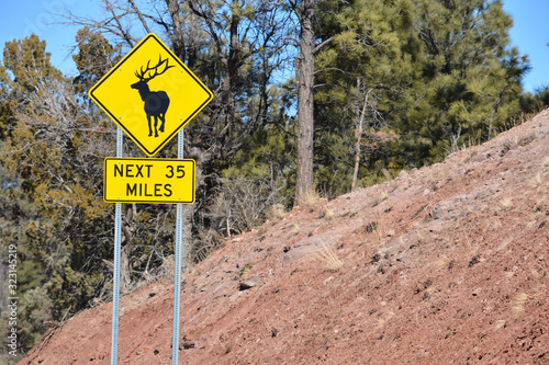 Elk Crossing Sign. Beware of Elk jaywalking across the road. Payson, Tonto National Forest. Arizona USA photo