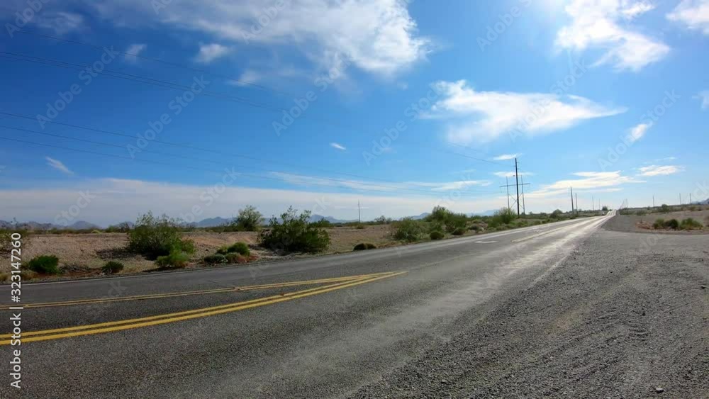 POV turning onto secondary highway and over a cattle grid - Parker Arizona POV turning onto secondary highway and over a cattle grid - Parker Arizona