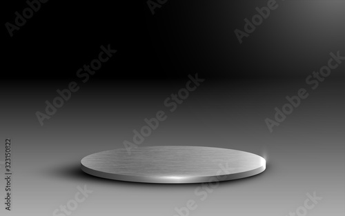 silver stand in the dark room	