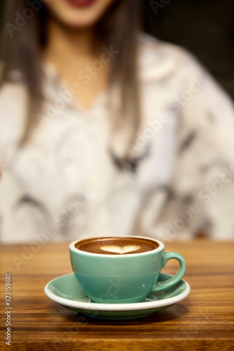Woman with Coffee Mug Hot latte art