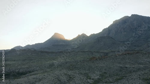 Drone footage of sunrise over mountains in Big Bend National Park West Texas. photo