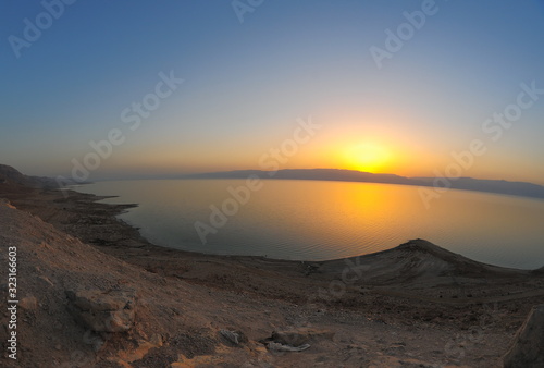 Dead Sea Israel Sunrise on the shore. Fish-eye lenses view