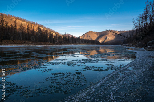 Frosty morning on the river. Oka district of Buryatia republic