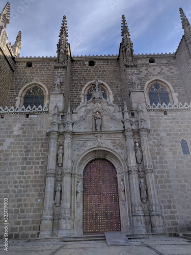 Gate of the monastery of San Juan de los Reyes, Toledo Spain photo