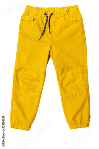 Yellow toddler-boy pants isolated on white background for spring and autumn wardrobe/ Сhildren's wear/ Close-up/ Flay lay/ Top view