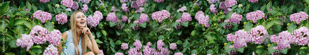 Portrait of beautiful woman with purple flower Portrait of beautiful woman with purple flower